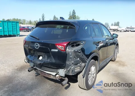 2014 Mazda Cx-5 Touring from USA, damaged, VIN JM3KE2CYXE0426946